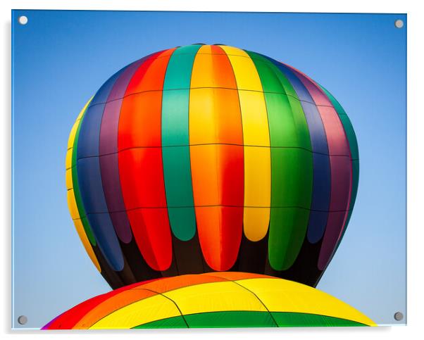 Colorful hot air balloon rising above another with Acrylic by Steve Heap