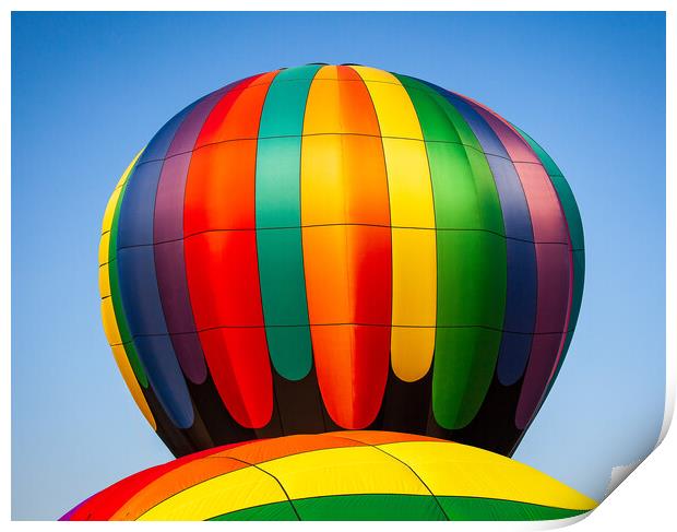 Colorful hot air balloon rising above another with Print by Steve Heap