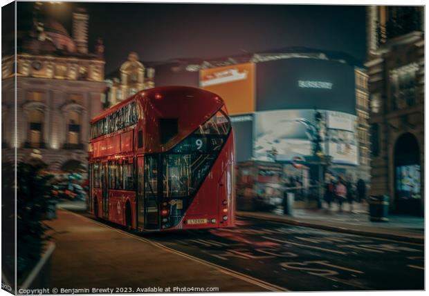 Red London Bus Motion Blur Canvas Print by Benjamin Brewty