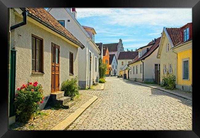 A Walk Through Historic Visby, Sweden Framed Print by Martyn Arnold