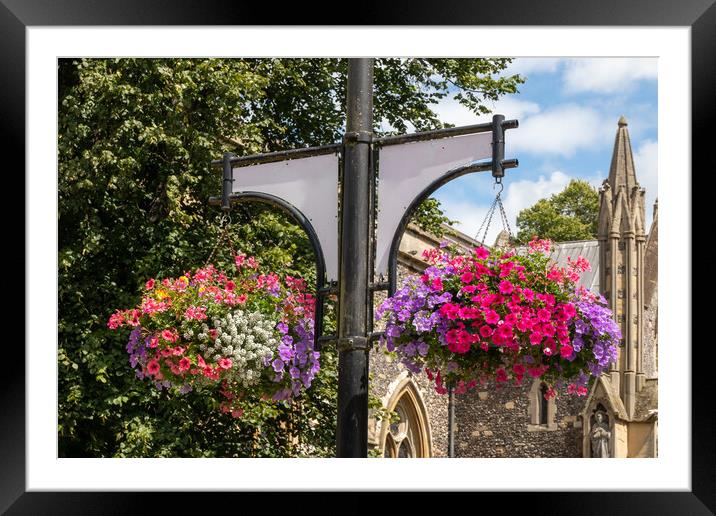 Hanging baskets outside St Marys Church, High Wycombe Framed Mounted Print by Kevin Hellon