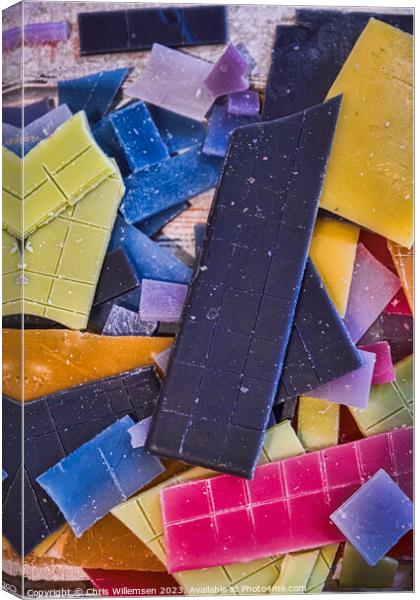 yellow blue orange and pink parts of candle wax Canvas Print by Chris Willemsen