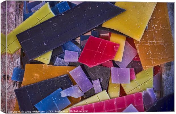 yellow blue orange and pink parts of candle wax Canvas Print by Chris Willemsen