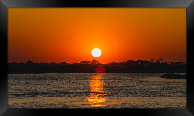 Ethereal Sunset: The Water's Mirror Framed Print by Margaret Ryan