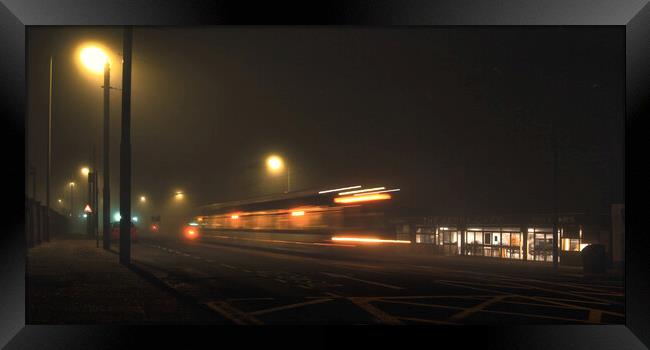 Late Night Tram Framed Print by Ian Blezard