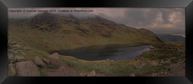 Moody panoramic of Low Water, Coniston Framed Print by Duncan Savidge