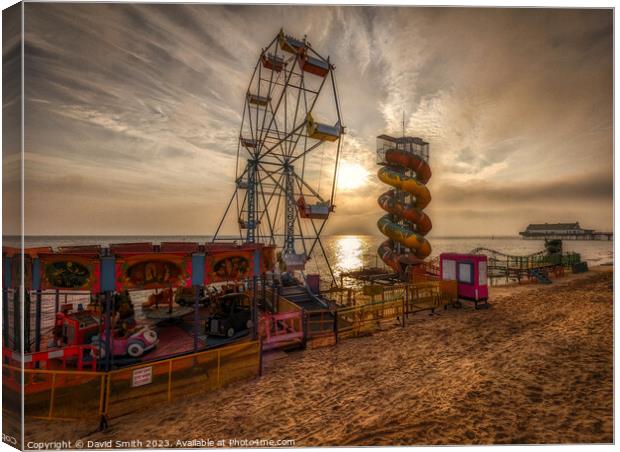 Rides on Cleethorpes Beach at sunrise Canvas Print by David Smith