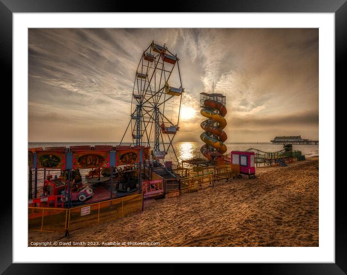 Rides on Cleethorpes Beach at sunrise Framed Mounted Print by David Smith