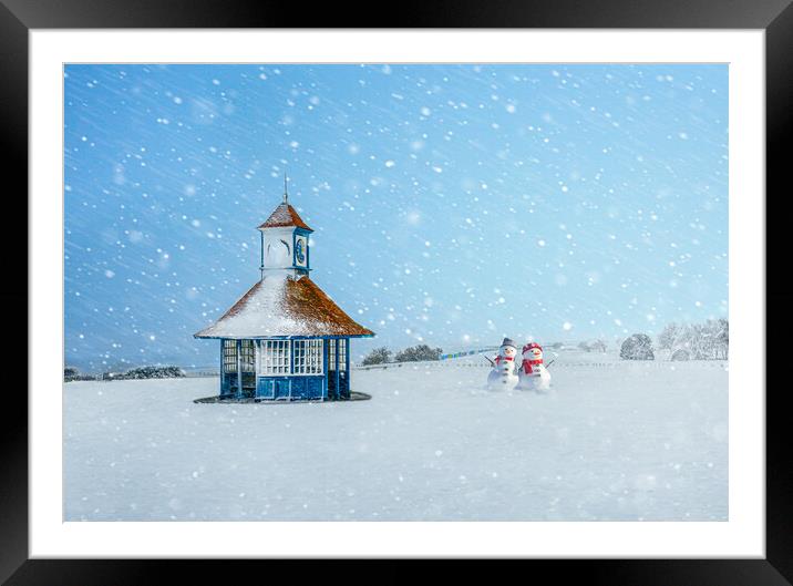 Snowy day at Frinton with cute snowmen Framed Mounted Print by Paula Tracy