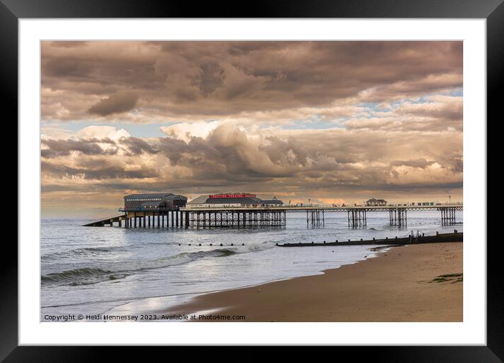 Cromer Pier in the Evening Sun as a Storm rolled i Framed Mounted Print by Heidi Hennessey
