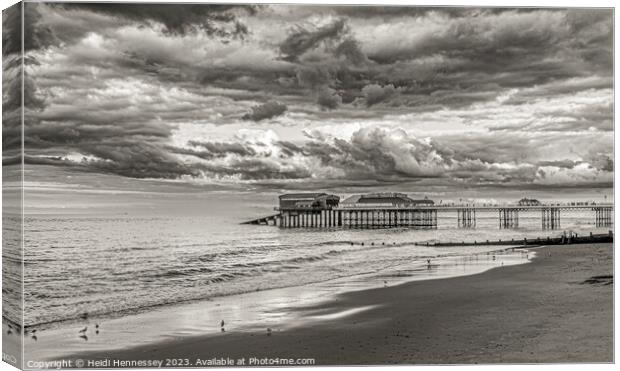 Stormy Clouds over the Pier Canvas Print by Heidi Hennessey
