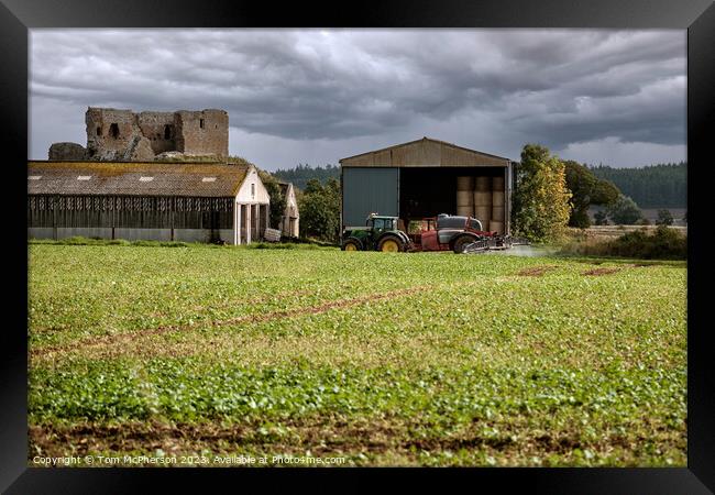 Crop Spraying at Duffus Castle Framed Print by Tom McPherson