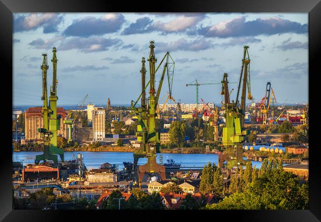 Gdansk Shipyard Cranes At Sunset In Poland Framed Print by Artur Bogacki