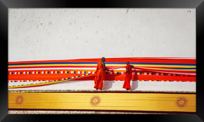 Monks wrap a ribbon around a Stupa in Anuradphura, Framed Print by Steven Nokes