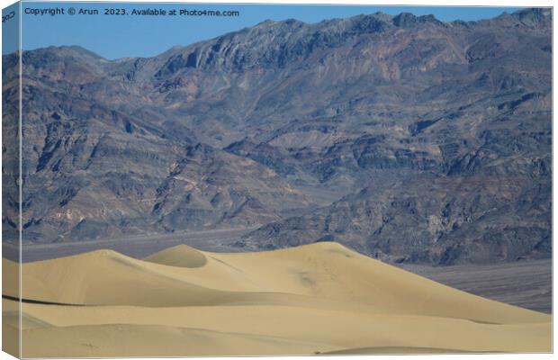 Sand dunes and mountains in death valley California Canvas Print by Arun 