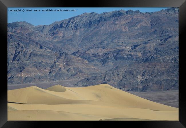 Sand dunes and mountains in death valley California Framed Print by Arun 
