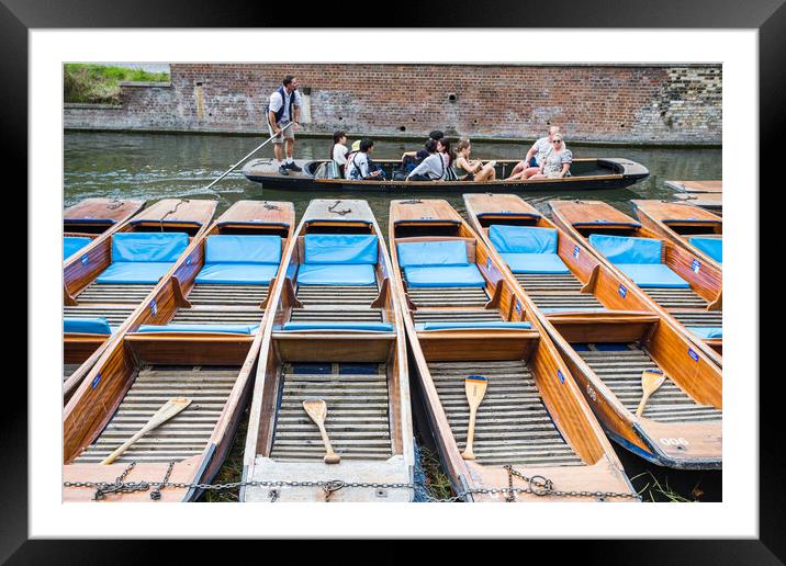 Tourists pass a row of punts Framed Mounted Print by Jason Wells