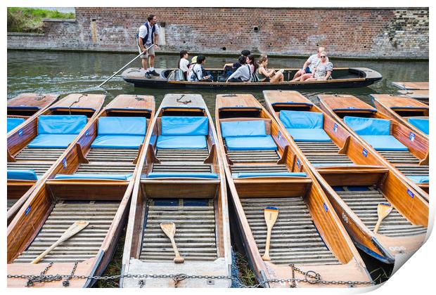 Tourists pass a row of punts Print by Jason Wells