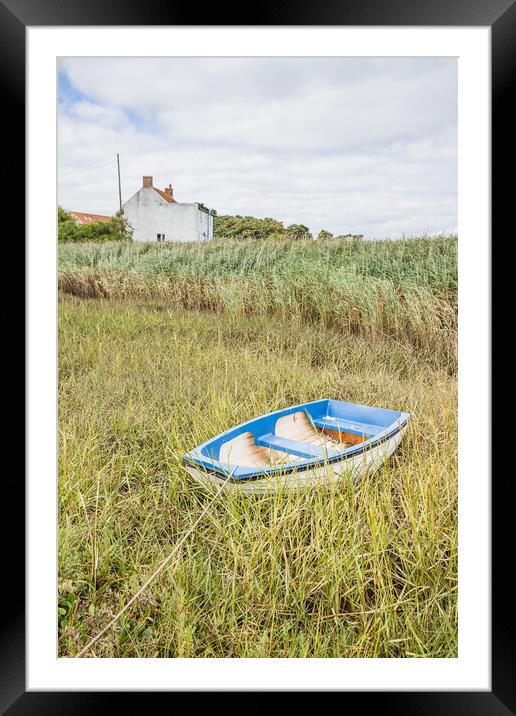 Boat tied at Brancaster Staithe Framed Mounted Print by Jason Wells