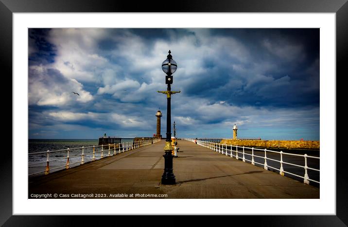 Whitby Lamps, piers, and Sunshine Framed Mounted Print by Cass Castagnoli