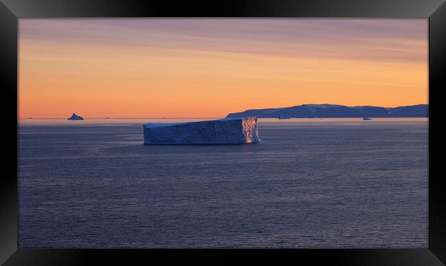 Iceberg seen from cruise ship vacation near Greenland coast in Arctic circle near Ilulissat Disko Bay Framed Print by Elijah Lovkoff