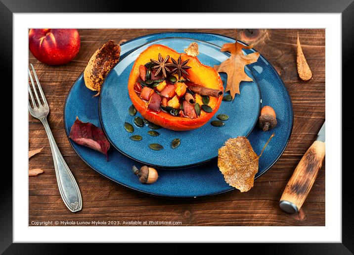 Baked half of pumpkin with fruits and spices. Framed Mounted Print by Mykola Lunov Mykola