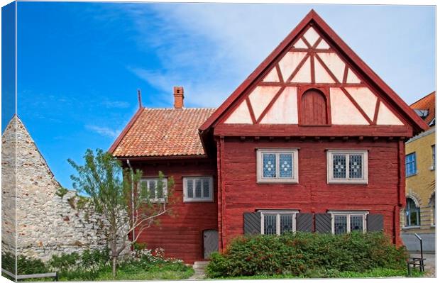 Wooden Burmeister House Visby, Sweden Canvas Print by Martyn Arnold