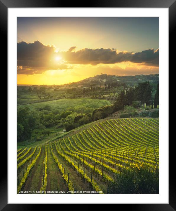 Vineyards at sunset and Casale Marittimo village. Tuscany Framed Mounted Print by Stefano Orazzini