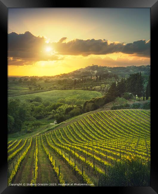 Vineyards at sunset and Casale Marittimo village. Tuscany Framed Print by Stefano Orazzini