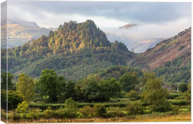 Early morning sun on Castle Crag Canvas Print by Keith Douglas