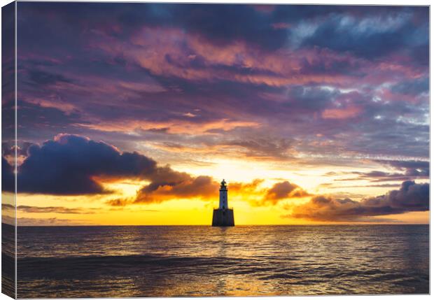 A Dramatic Sunrise at Rattray Head Lighthouse  Canvas Print by Anthony McGeever