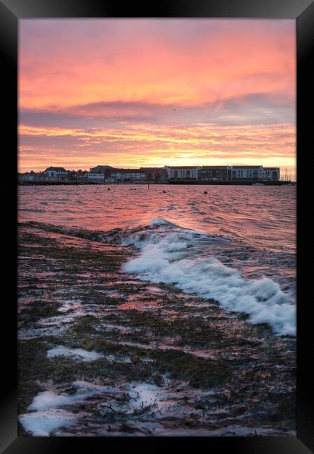 Sunrise colours over the Brightlingsea promenade  Framed Print by Tony lopez