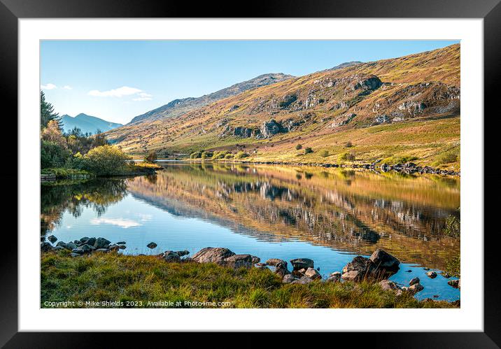 A Calm reflective Lake Framed Mounted Print by Mike Shields