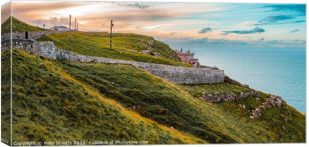 The Llandudno Lighthouse. Canvas Print by Mike Shields