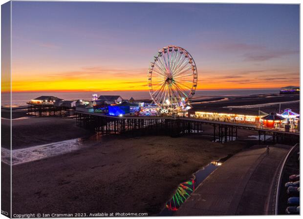 Central Pier and Ferris Wheel at Sunset Canvas Print by Ian Cramman