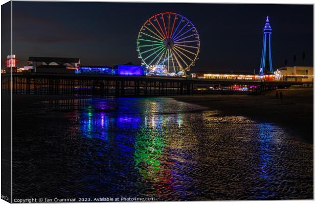 Central Pier and Ferris Wheel at Night Canvas Print by Ian Cramman