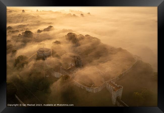 Carisbrooke Castle at dawn mist Framed Print by Ian Plested