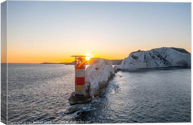 The Needles Lighthouse at dawn  Canvas Print by Ian Plested