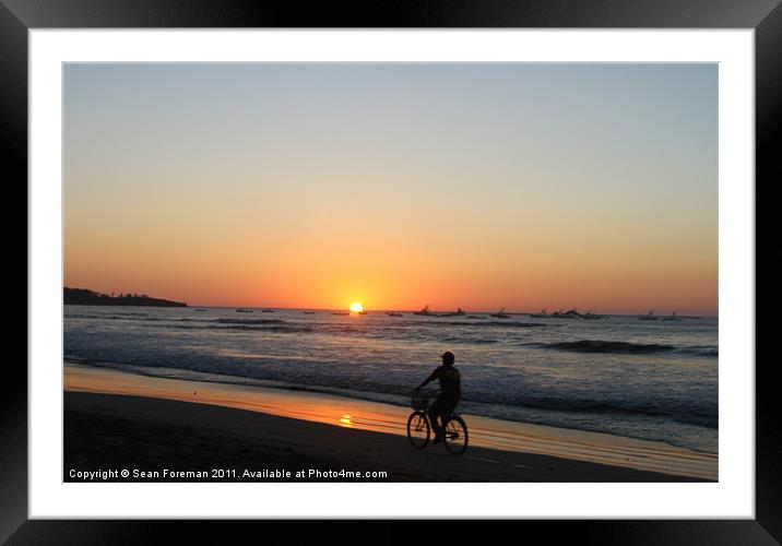 Cycling at Sunset Framed Mounted Print by Sean Foreman