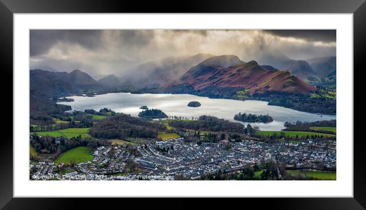 Keswick under storm clouds Framed Mounted Print by Chris Drabble