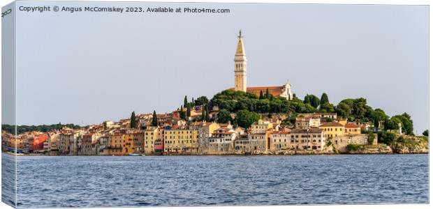 Panoramic view of waterfront of Rovinj in Croatia Canvas Print by Angus McComiskey