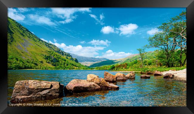 Foreground Rocks in a Clear Lake Framed Print by Mike Shields