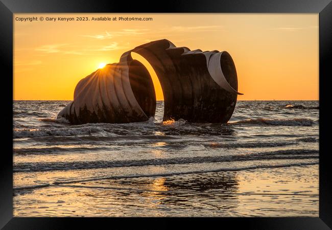 Marys Shell At Sunset with a golden sky Framed Print by Gary Kenyon