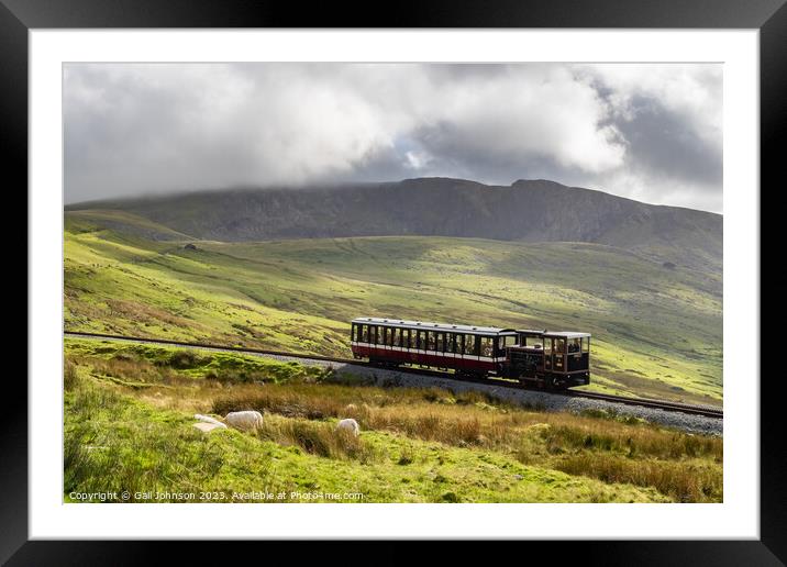 Views around Snowdon with trains running up to the summit  Framed Mounted Print by Gail Johnson