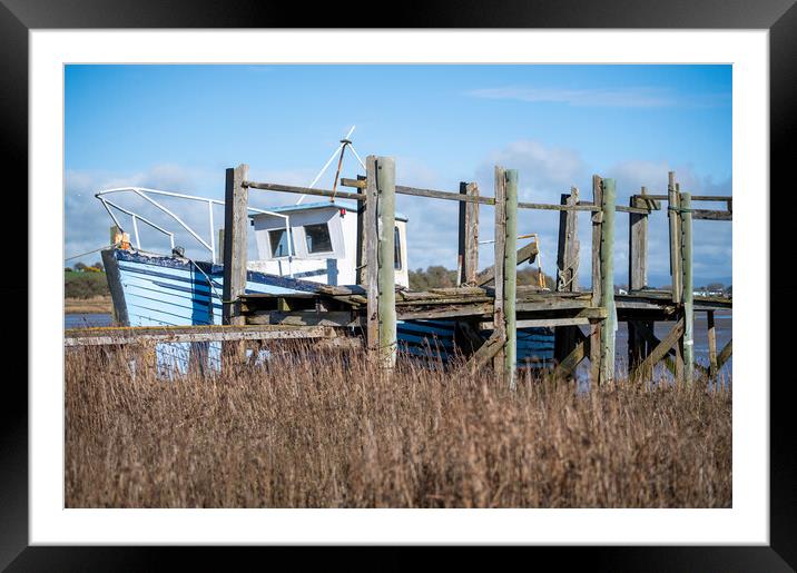 Blue Wooden Boat at the jetty Framed Mounted Print by Gary Kenyon
