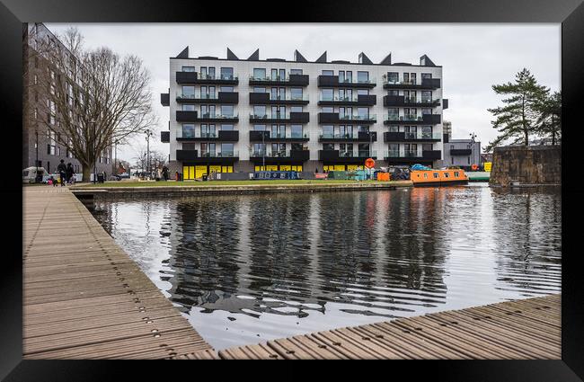 Keepers Quay reflecting in the water Framed Print by Jason Wells