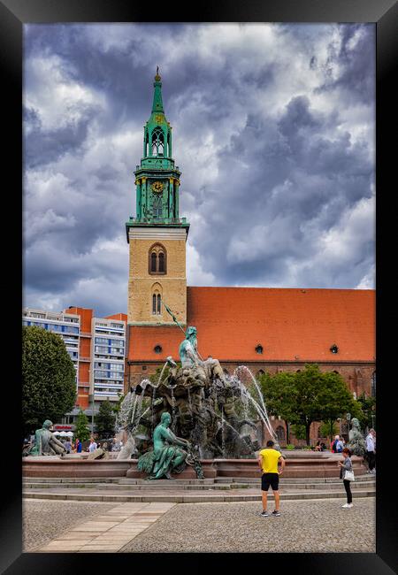 Neptune Fountain and St Mary Church in Berlin Framed Print by Artur Bogacki