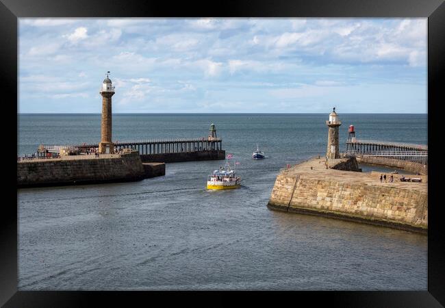 Whitby Harbour East and West Piers Framed Print by Derek Beattie
