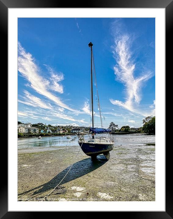 Lone yacht on the Kingsbridge estuary Devon Framed Mounted Print by Roger Mechan