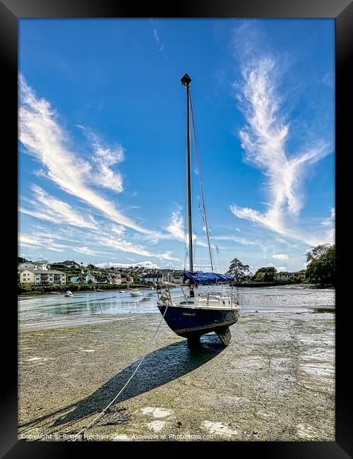 Lone yacht on the Kingsbridge estuary Devon Framed Print by Roger Mechan